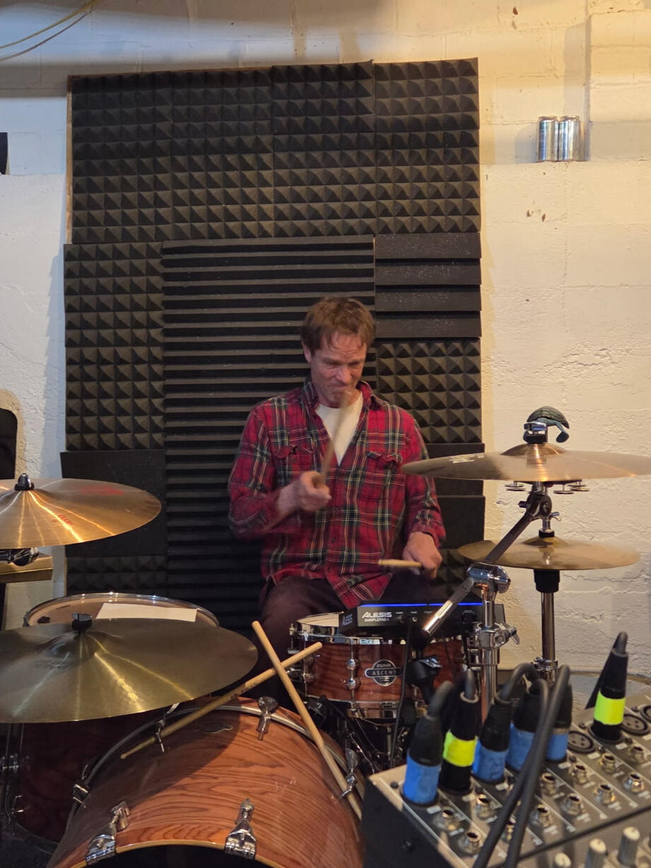 Bruce at Practice In Search of More Cowbell!